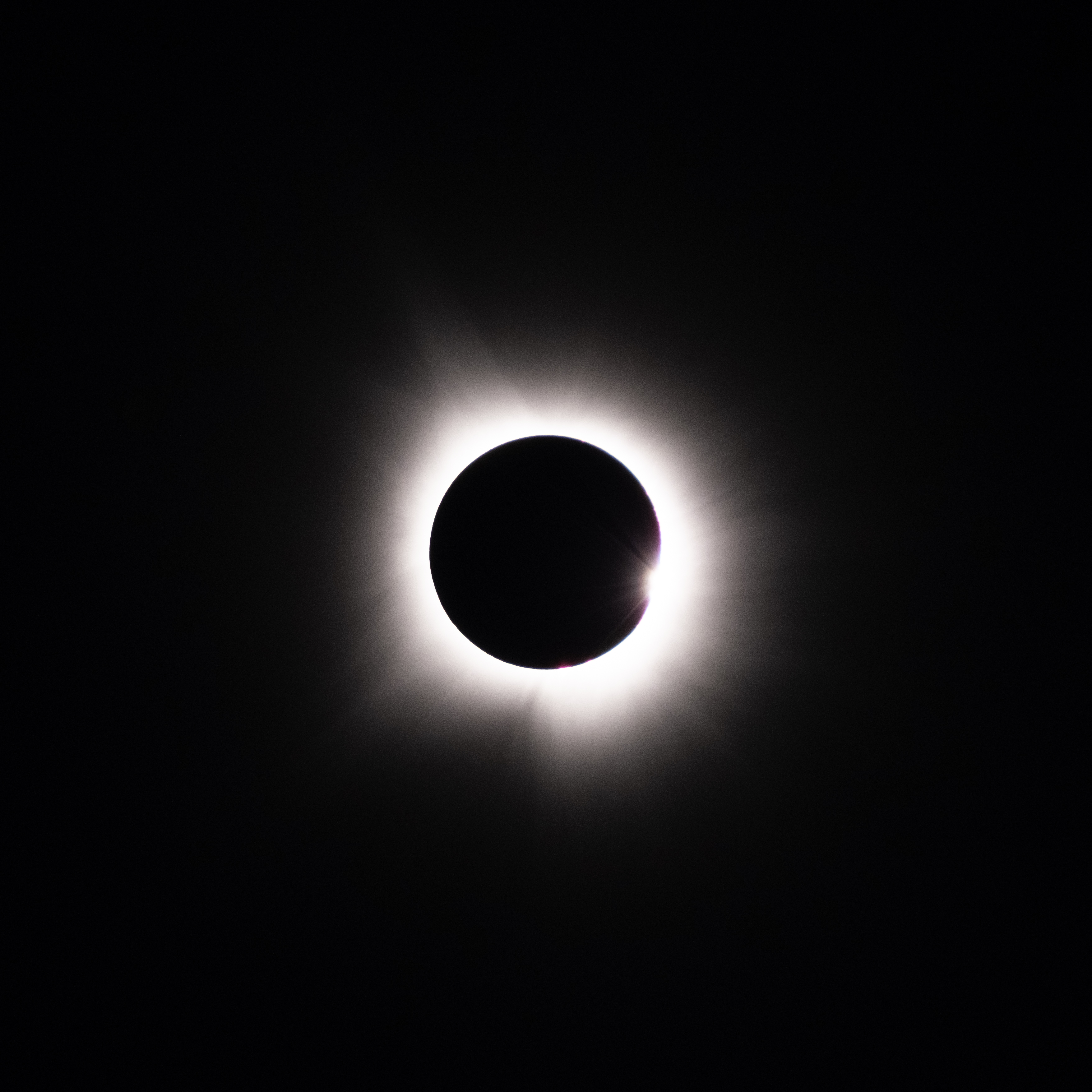 Eclipse with Baily's Bead visible in lower-right